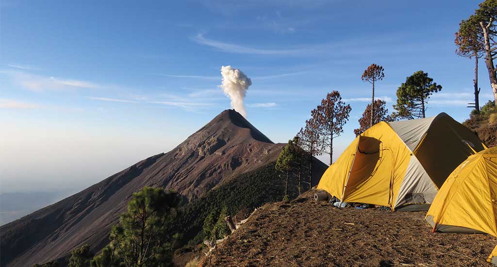 camp ground with a vie of Volcan de Fuego